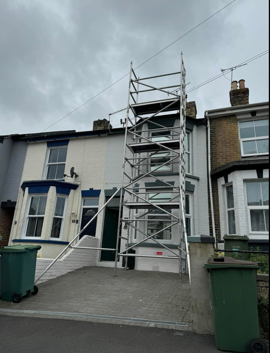 Residential building with construction scaffolding