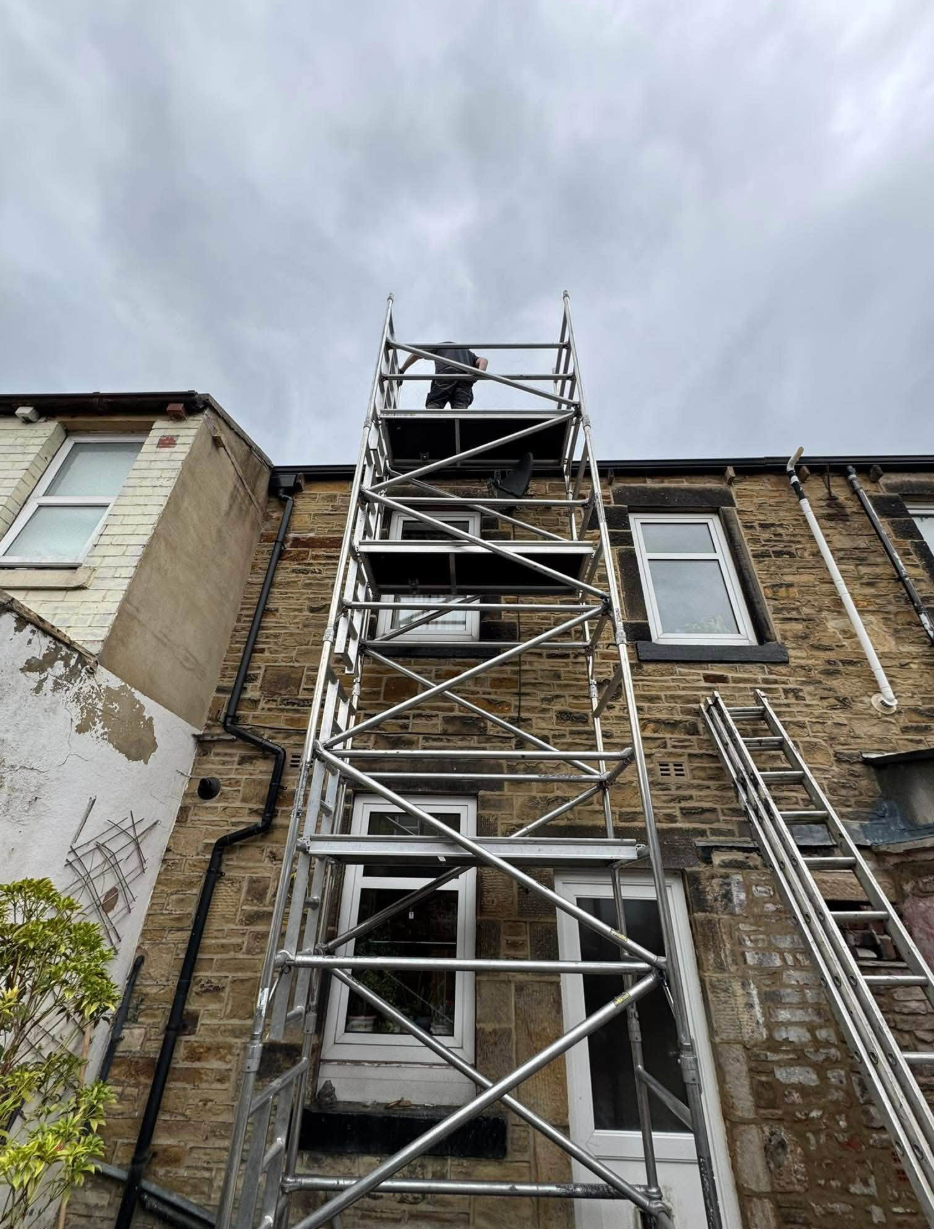 Scaffolding on stone building facade