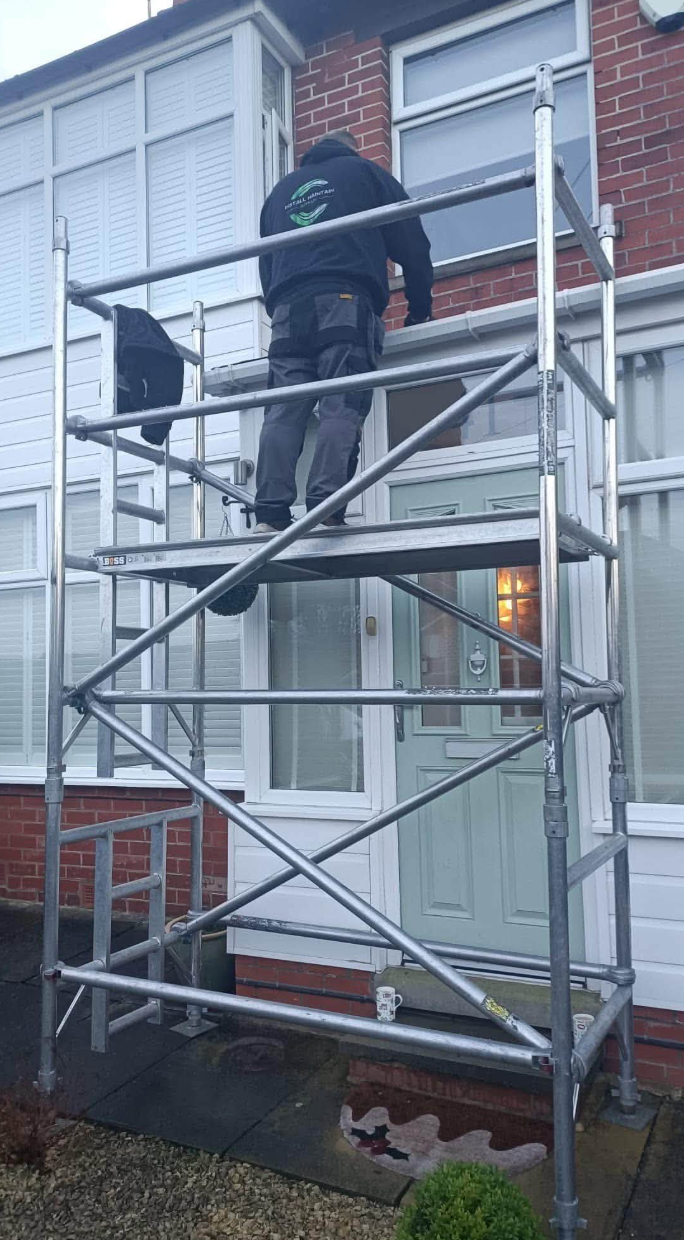 IMS engineer on scaffolding at residential property